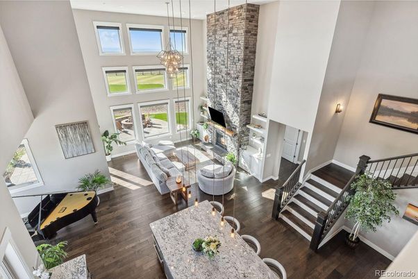 Chandelier, Dining room, Fireplace, Interior, Living room, Pendant Lights, Wood Texture Flooring