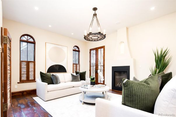 Chandelier, Fireplace, Interior, Living room, Pendant Lights, Recessed Lighting, Wood Texture Flooring