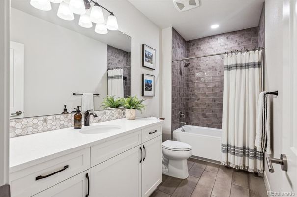 Bathroom, Dual Sink Vanities, Interior, Recessed Lighting, Wood Texture Flooring