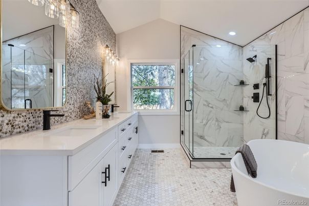 Bathroom, Dual Sink Vanities, Free Standing Baths, Glass Shower, Interior, Marble Walls, Recessed Lighting