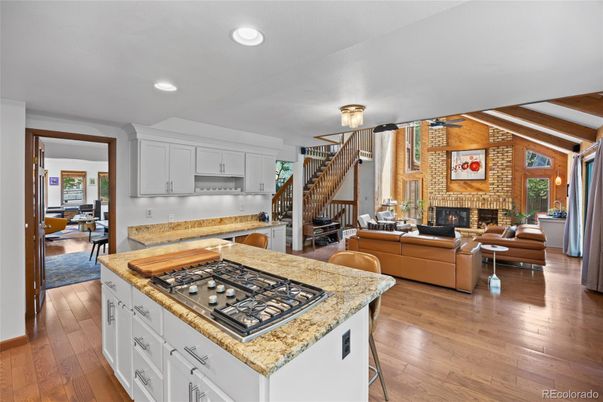 Dining room, Fireplace, Interior, Kitchen, Living room, Recessed Lighting, Stone Walls, Wooden Beams, Wood Texture Flooring
