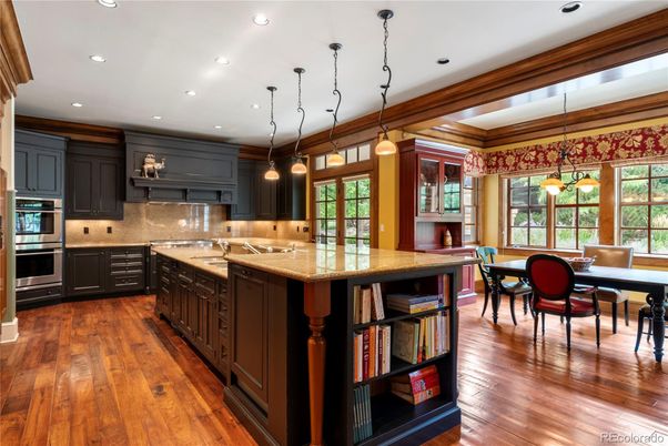 Dining room, Interior, Kitchen, Pendant Lights, Recessed Lighting, Stainless Steel Appliances, Wood Texture Flooring