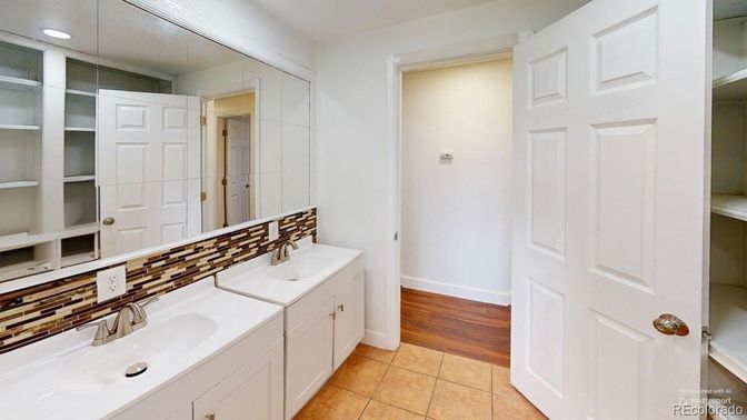 Bathroom, Dual Sink Vanities, Interior, Recessed Lighting, Wood Texture Flooring
