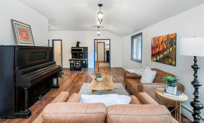 Fireplace, Interior, Living room, Pendant Lights, Piano, Wood Texture Flooring