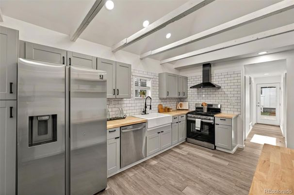 Interior, Kitchen, Recessed Lighting, Stainless Steel Appliances, Stone Walls, Wood Texture Flooring