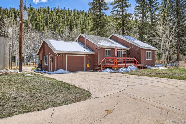 Attached, Exterior, Facade, Log Home