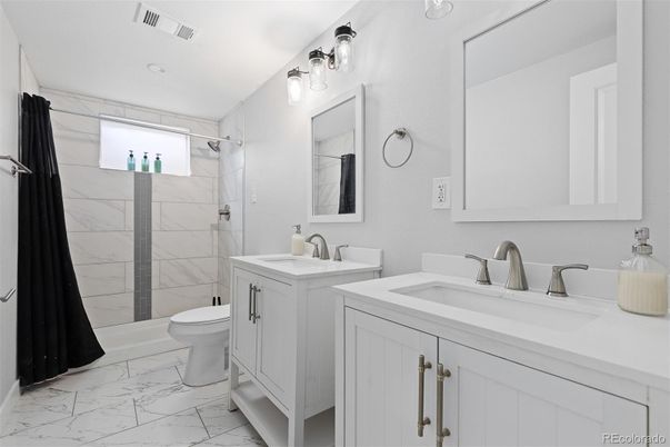 Bathroom, Dual Sink Vanities, Glass Shower, Interior, Marble, Marble Walls