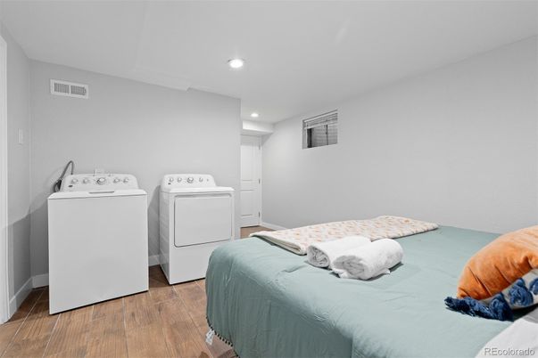 Bedroom, Interior, Recessed Lighting, Washer, Wood Texture Flooring