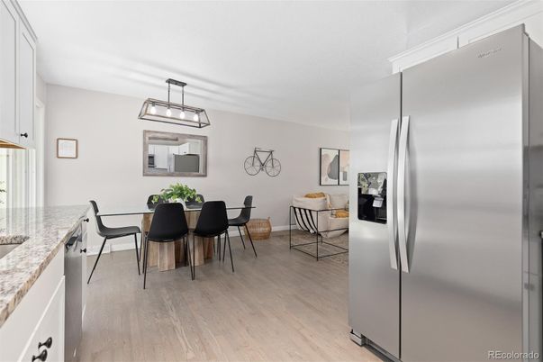 Dining room, Interior, Kitchen, Pendant Lights, Stainless Steel Appliances, Wood Texture Flooring
