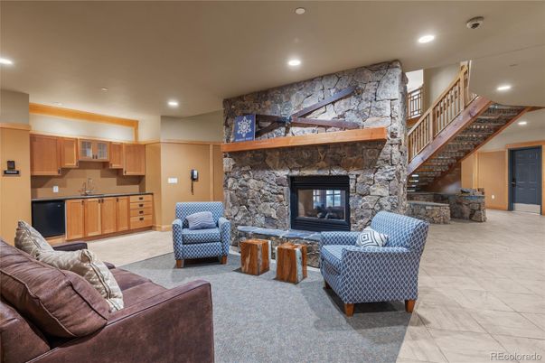 Fireplace, Interior, Living room, Marble, Recessed Lighting, Stone Walls