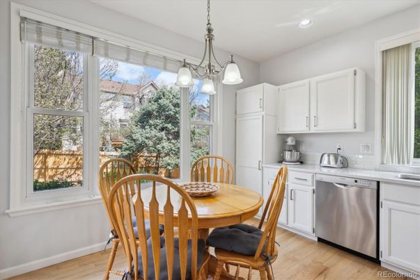 Dining room, Interior, Kitchen, Pendant Lights, Recessed Lighting, Stainless Steel Appliances, Wood Texture Flooring