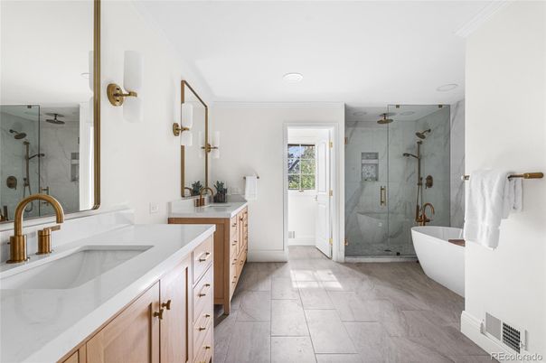 Bathroom, Dual Sink Vanities, Free Standing Baths, Glass Shower, Interior, Marble Walls, Recessed Lighting