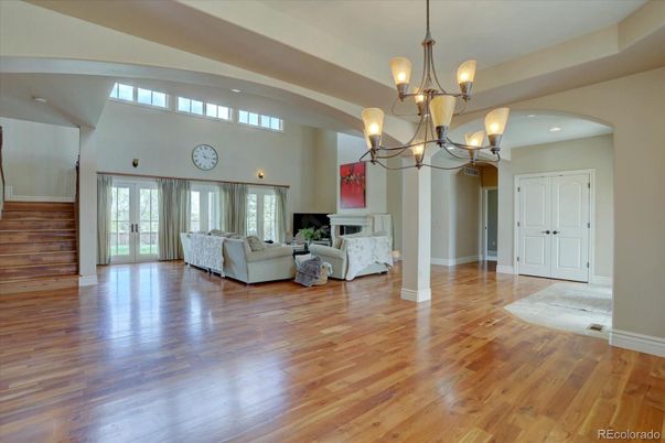 Chandelier, Fireplace, Interior, Living room, Pendant Lights, Recessed Lighting, Wood Texture Flooring