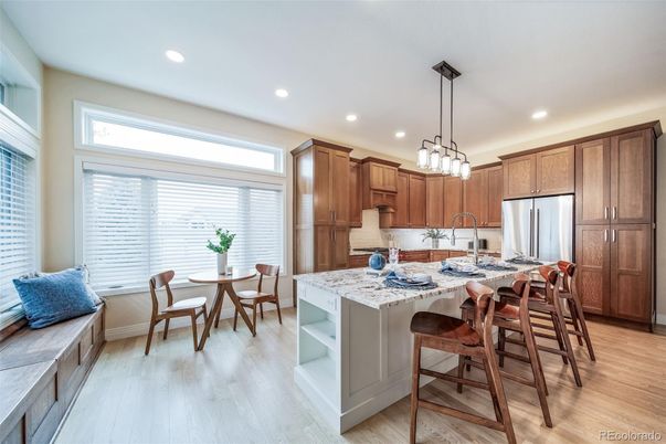 Dining room, Interior, Kitchen, Pendant Lights, Recessed Lighting, Stainless Steel Appliances, Wood Texture Flooring