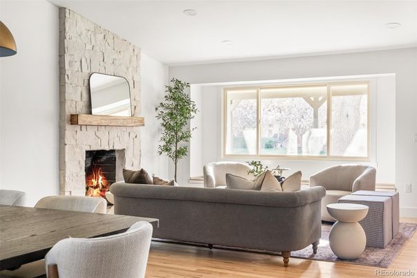 Fireplace, Interior, Living room, Recessed Lighting, Stone Walls, Wood Texture Flooring