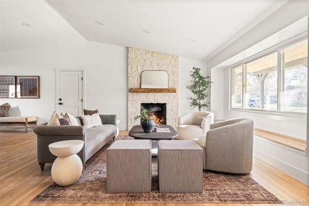 Fireplace, Interior, Living room, Recessed Lighting, Stone Walls, Wood Texture Flooring