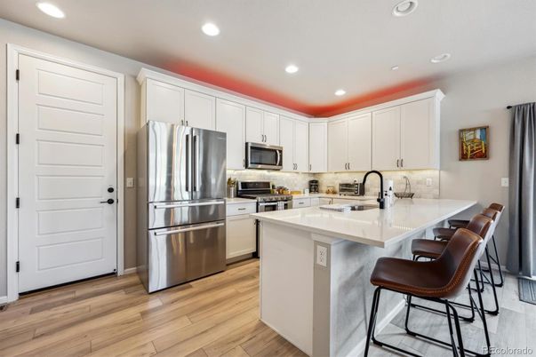 Interior, Kitchen, Recessed Lighting, Stainless Steel Appliances, Wood Texture Flooring
