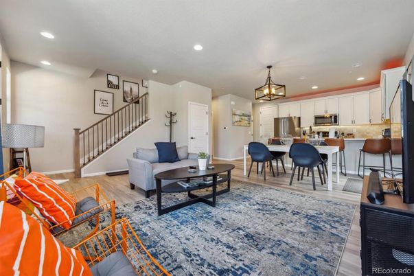 Dining room, Interior, Kitchen, Living room, Pendant Lights, Recessed Lighting, Stainless Steel Appliances, Wood Texture Flooring
