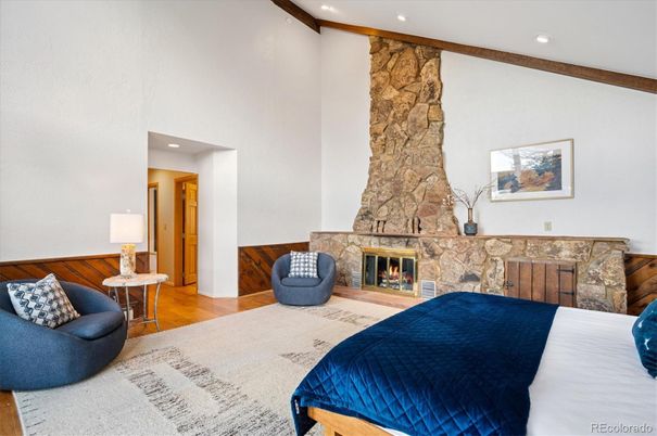 Bedroom, Fireplace, Interior, Recessed Lighting, Stone Walls, Wood Texture Flooring