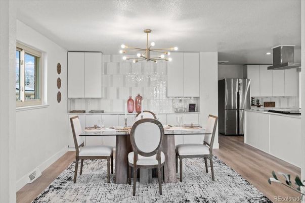 Dining room, Interior, Kitchen, Pendant Lights, Recessed Lighting, Stainless Steel Appliances, Wood Texture Flooring