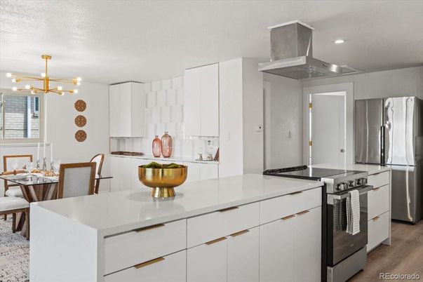 Dining room, Interior, Kitchen, Pendant Lights, Recessed Lighting, Stainless Steel Appliances, Wood Texture Flooring