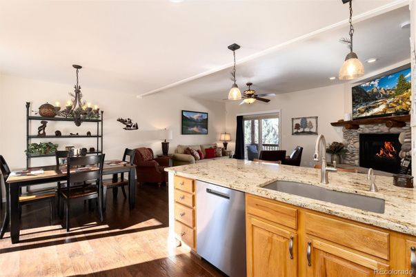 Dining room, Fireplace, Interior, Kitchen, Living room, Pendant Lights, Recessed Lighting, Wood Texture Flooring