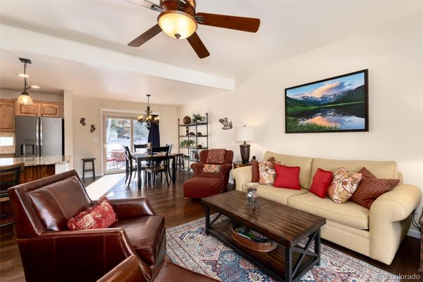 Chandelier, Dining room, Interior, Kitchen, Living room, Pendant Lights, Stainless Steel Appliances, Wood Texture Flooring