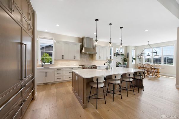 Dining room, Interior, Kitchen, Pendant Lights, Recessed Lighting, Stainless Steel Appliances, Wood Texture Flooring