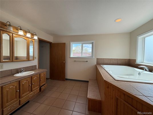 Bathroom, Dual Sink Vanities, Interior, Recessed Lighting, Tile Countertops