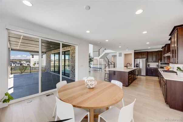 Dining room, Interior, Kitchen, Recessed Lighting, Stainless Steel Appliances, Wood Texture Flooring