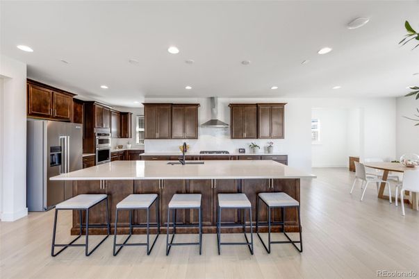Dining room, Interior, Kitchen, Recessed Lighting, Stainless Steel Appliances, Wood Texture Flooring