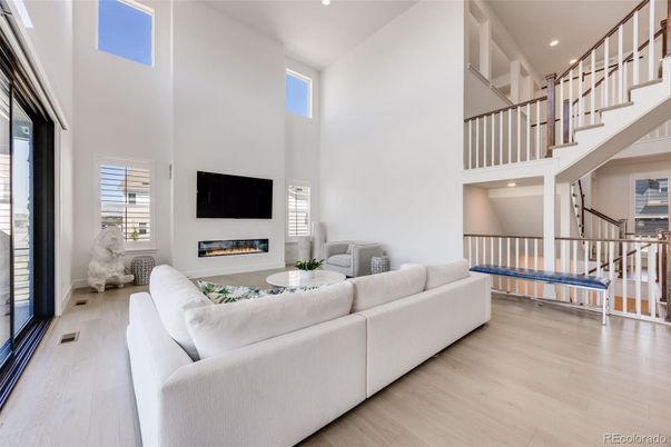 Fireplace, Interior, Living room, Recessed Lighting, Wood Texture Flooring