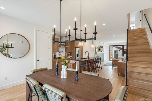 Dining room, Interior, Kitchen, Pendant Lights, Recessed Lighting, Stainless Steel Appliances, Wood Texture Flooring