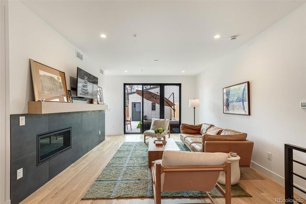 Fireplace, Interior, Living room, Recessed Lighting, Wood Texture Flooring