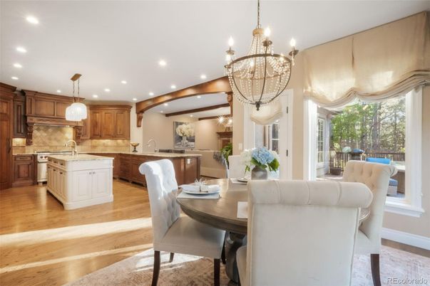 Chandelier, Dining room, Interior, Kitchen, Pendant Lights, Recessed Lighting, Stainless Steel Appliances, Wood Texture Flooring