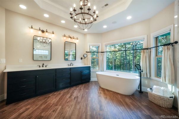 Bathroom, Chandelier, Dual Sink Vanities, Free Standing Baths, Interior, Recessed Lighting, Wood Texture Flooring
