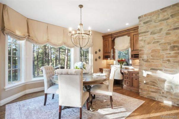 Chandelier, Dining room, Interior, Recessed Lighting, Stone Walls, Wood Texture Flooring