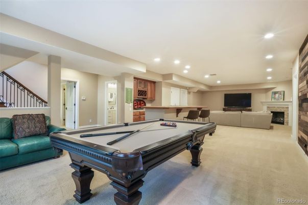 Billiard Table, Fireplace, Game Room, Interior, Living room, Recessed Lighting, Stone Walls