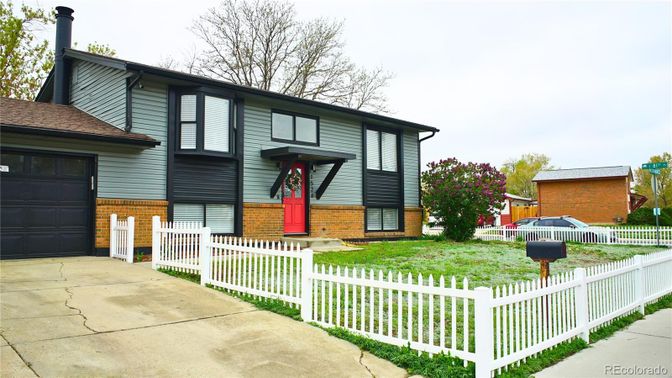 Attached, Backyard, Exterior, Facade, Brick Facade, Raised Ranch