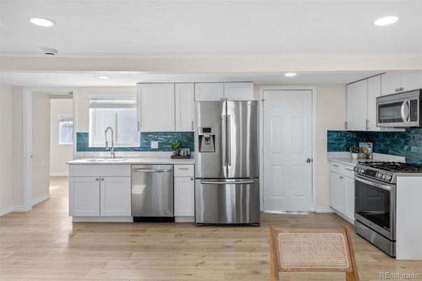 Interior, Kitchen, Recessed Lighting, Stainless Steel Appliances, Wood Texture Flooring
