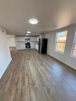 Empty room, Interior, Kitchen, Stainless Steel Appliances, Wood Texture Flooring