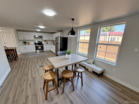 Dining room, Interior, Kitchen, Pendant Lights, Stainless Steel Appliances, Wood Texture Flooring