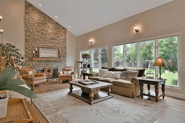 Fireplace, Interior, Living room, Recessed Lighting, Stone Walls, Wood Texture Flooring