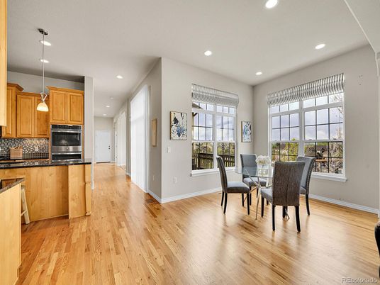 Dining room, Interior, Kitchen, Pendant Lights, Recessed Lighting, Stainless Steel Appliances, Wood Texture Flooring
