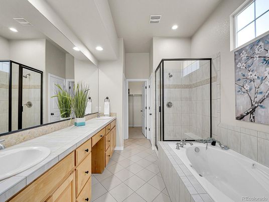 Bathroom, Dual Sink Vanities, Glass Shower, Interior, Recessed Lighting, Tile Countertops