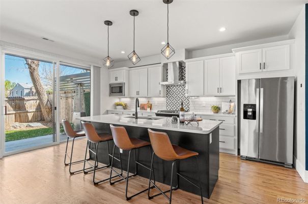 Interior, Kitchen, Pendant Lights, Recessed Lighting, Stainless Steel Appliances, Wood Texture Flooring