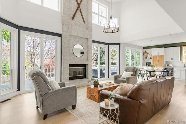 Dining room, Fireplace, Interior, Kitchen, Living room, Pendant Lights, Stone Walls, Wood Texture Flooring
