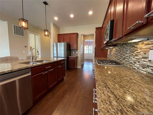 Interior, Kitchen, Pendant Lights, Recessed Lighting, Stainless Steel Appliances, Wood Texture Flooring