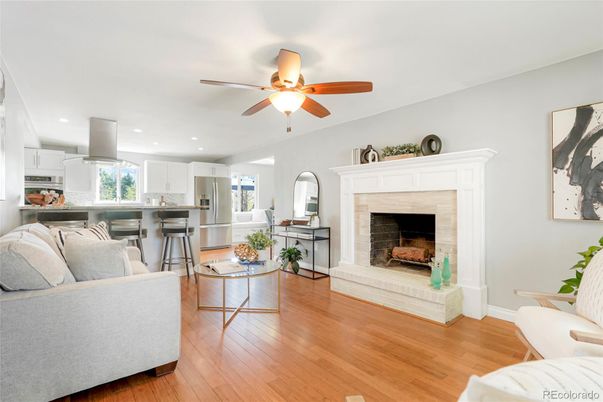 Fireplace, Interior, Kitchen, Living room, Recessed Lighting, Stainless Steel Appliances, Wood Texture Flooring