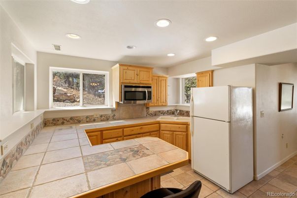 Interior, Kitchen, Recessed Lighting, Tile Countertops